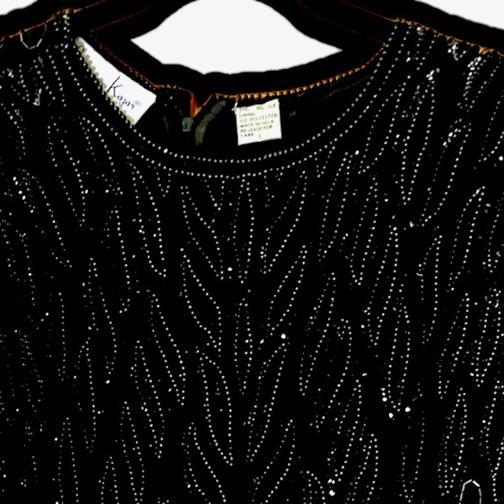 Cocktail dress.  Beaded dress front and back.  Knee length.